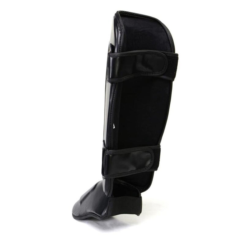 Beginner boxing shin guards with adjustable straps for a secure fit.