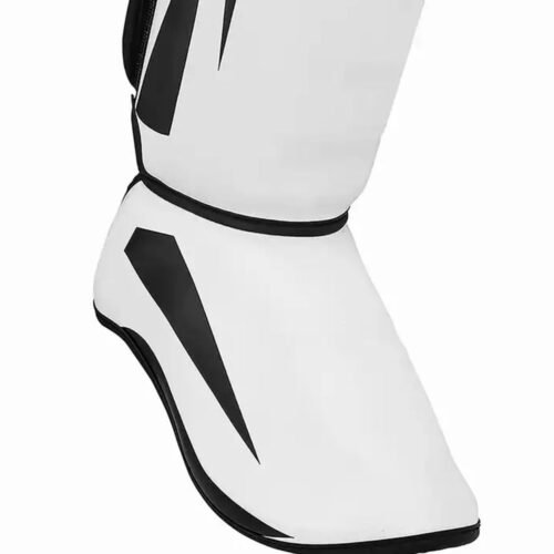 Champion shin guards with adjustable straps for a secure fit.