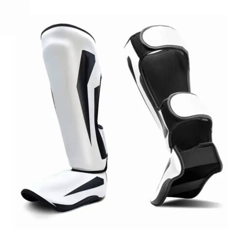 Champion shin guards with premium protection for martial arts.