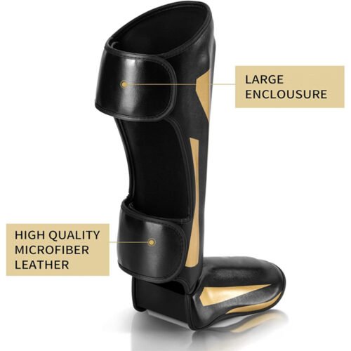 Custom leather shin guards for boxing with adjustable straps.