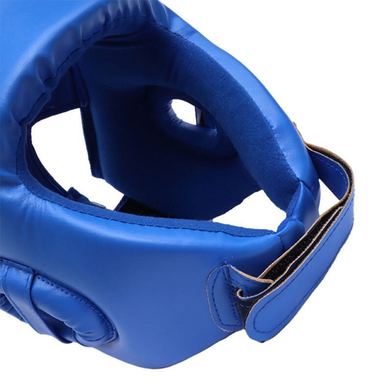 Adjustable boxing head guard for comprehensive facial protection.