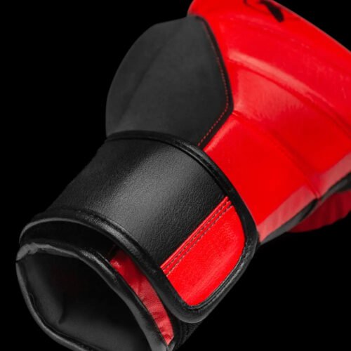 Durable PU leather TopBoxer boxing gloves for fighters.